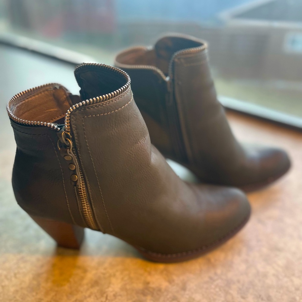 Olive green booties with zipper detail